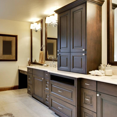 Custom Bathroom Cabinetry with plenty of storage by Heartwood Custom Cabinetry